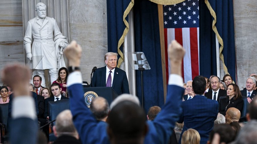 Attendees cheer as President Donald Trump speaks after taking the oath of office during the 60th Presidential Inauguration in the Rotunda of the U.S. Capitol in Washington, Monday, Jan. 20, 2025.