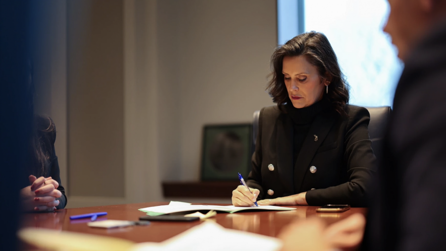 Governor Gretchen Whitmer signs bills into law in Lansing on December 17, 2024.