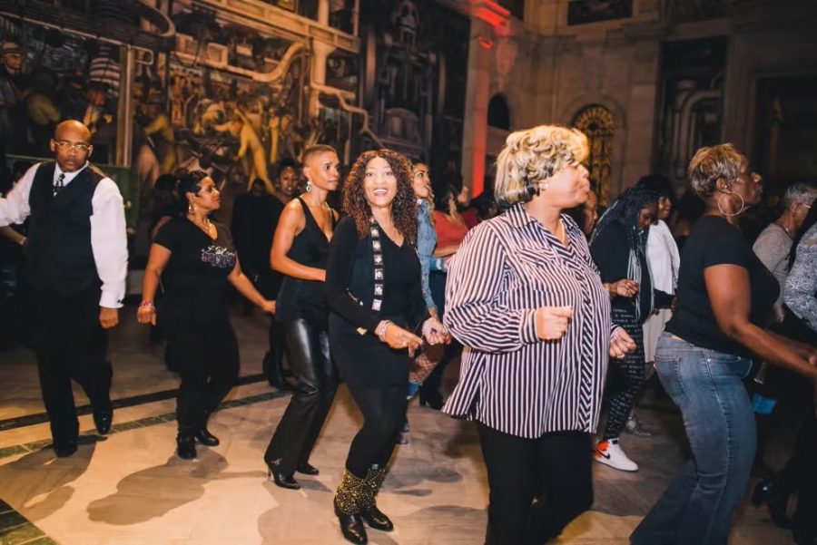 A crowd dances in Rivera Court at the DIA