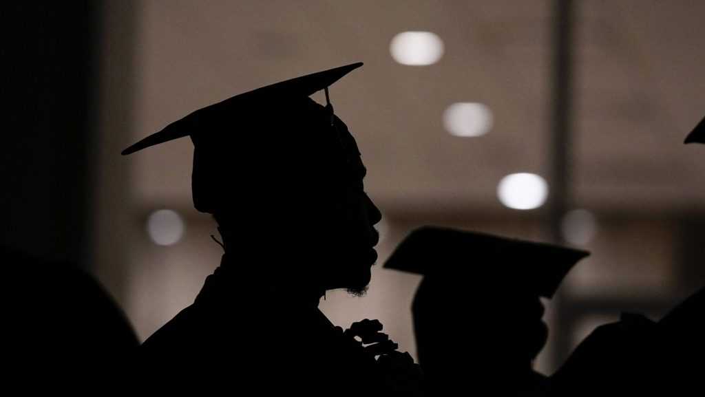 FILE - A Morehouse College student lines up before the school commencement, May 19, 2024, in Atlanta.