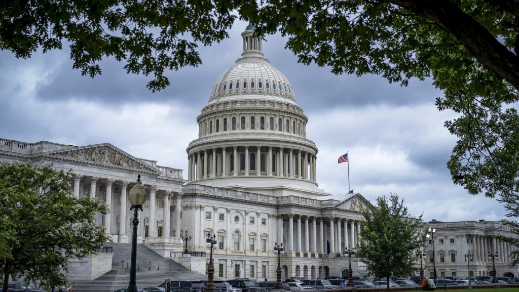 The Capitol is seen under dark skies in Washington, Tuesday, July 15, 2025.