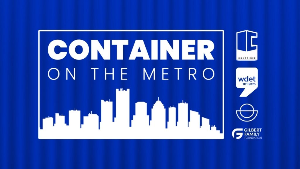 Blue shipping container with white text that says "Container on The Metro"