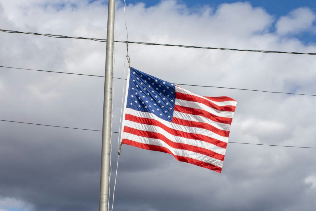 American flag flown at half-staff.