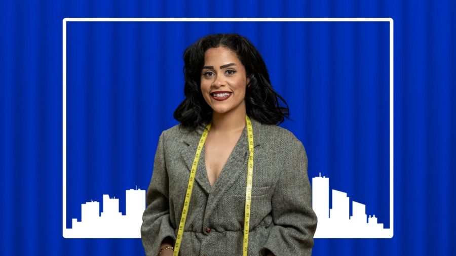 Nabeela Najjar headshot with a blue backgound that has the detroit cityscape outline behind her.