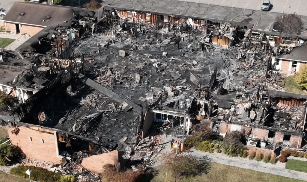 Rubbles and ash remain after a gunman crashed into the side of the Church of Latter Day Saints in Grand Blanc, Michigan before open firing and setting it ablaze.