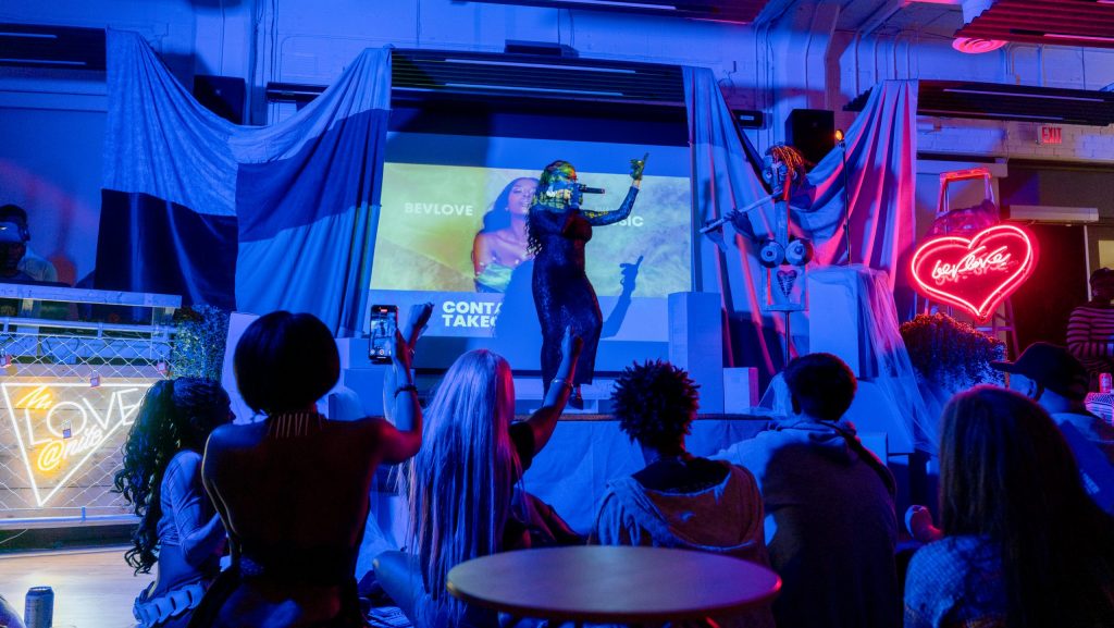 Bevlove performs onstage at a Container event