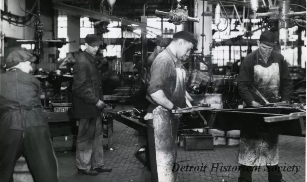 Men at work manufacturing in the Detroit Packard Plant